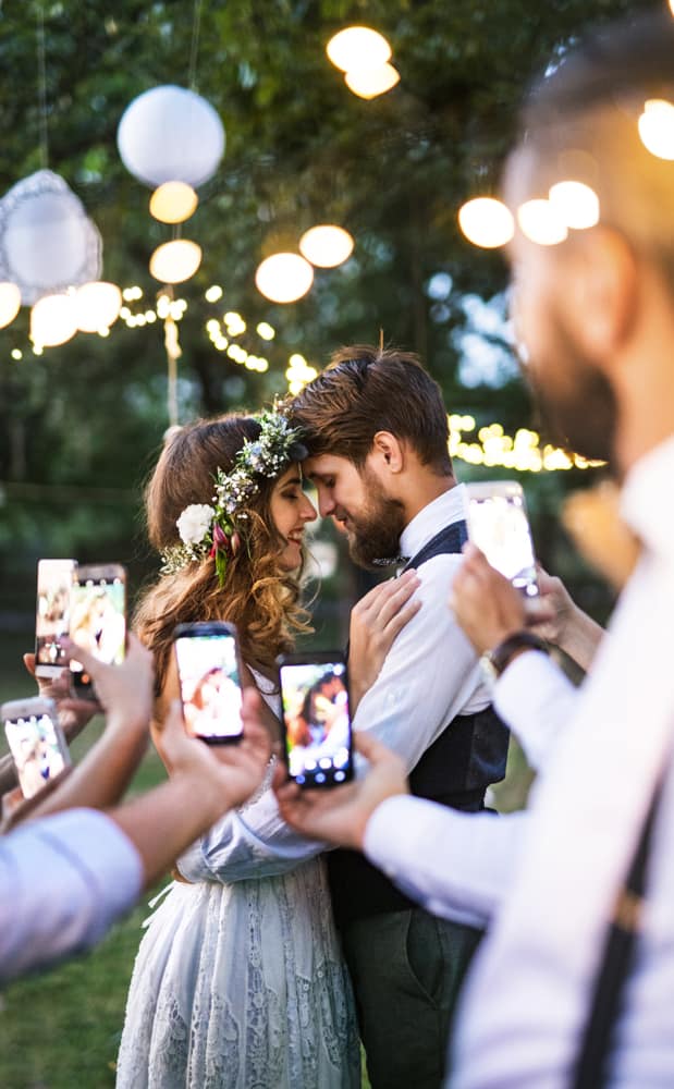 Close up of a hand holding a smartphone taking a photo